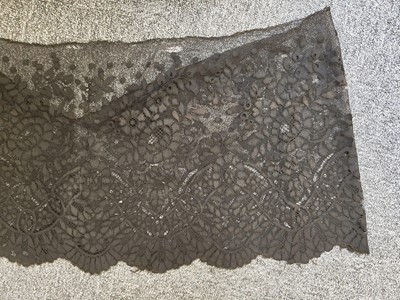 Lot 761 - Lace. Four large flounces, 19th century, & other lace