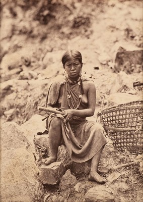 Lot 7 - Bourne (Samuel, 1834-1912). Lepcha woman sitting on a stone, Darjeeling, c. 1870, albumen print