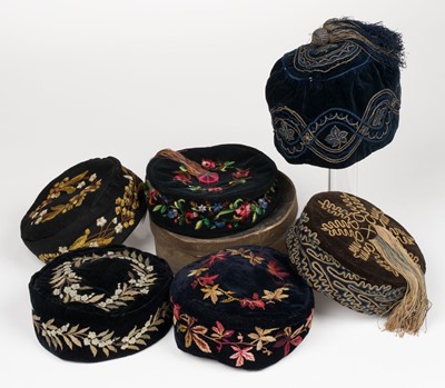 Lot 421 - Clothing. A collection of six embroidered smoking hats, mid-late 19th century
