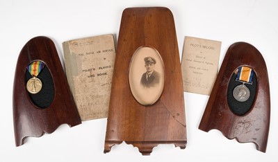 Lot 43 - RNAS Logbook. WWI Royal Naval Air Service logbook kept by Flight Officer R.A.H. Shelford