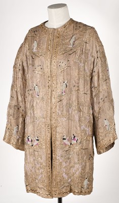 Lot 457 - Chinoiserie. A beaded gold lamé coat, 1920s