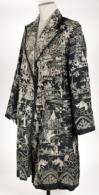 Lot 456 - Chinese. An embroidered coat, early 20th century, & an embroidered jacket and skirt