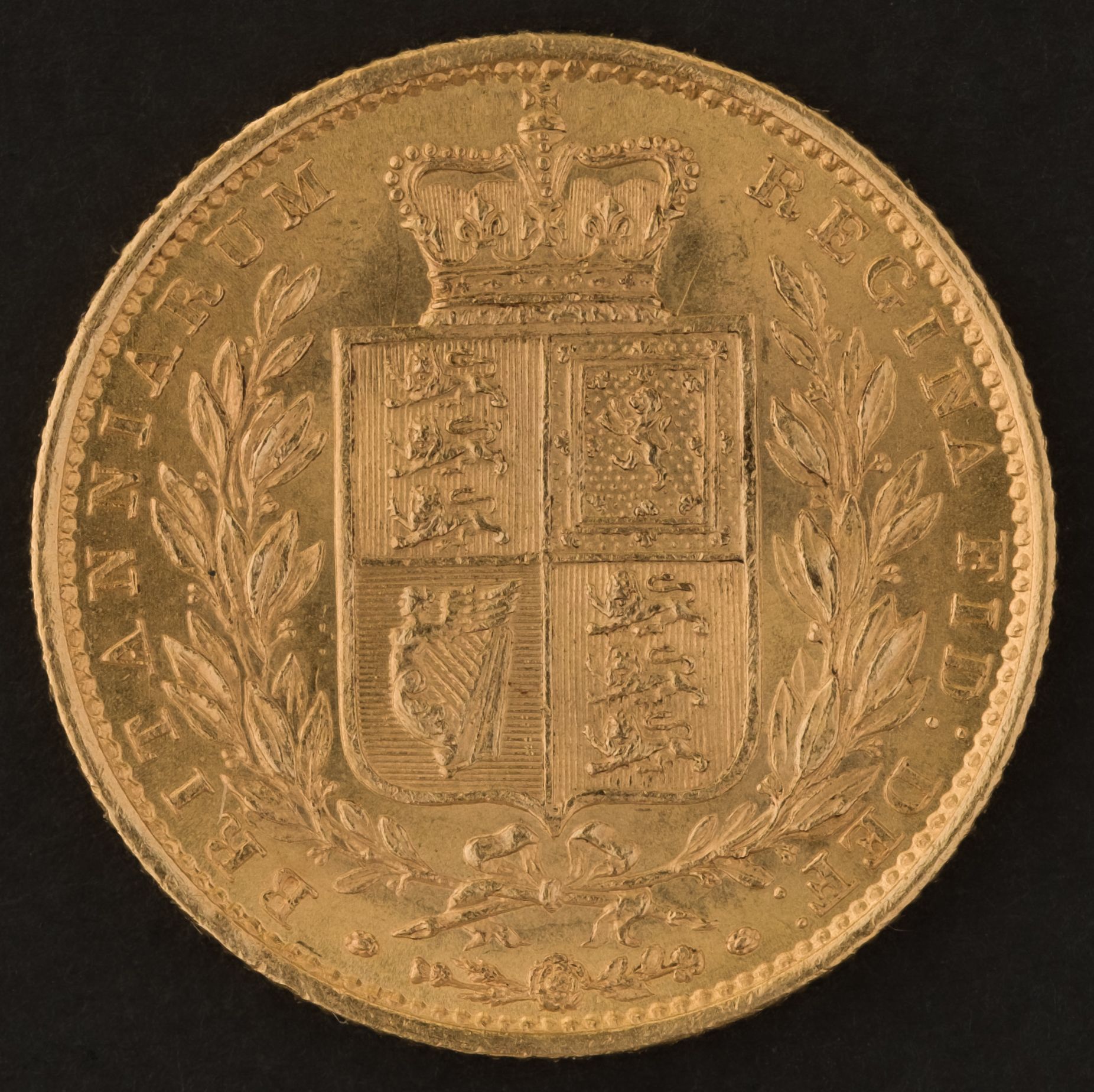 A Victorian Sovereign coin.